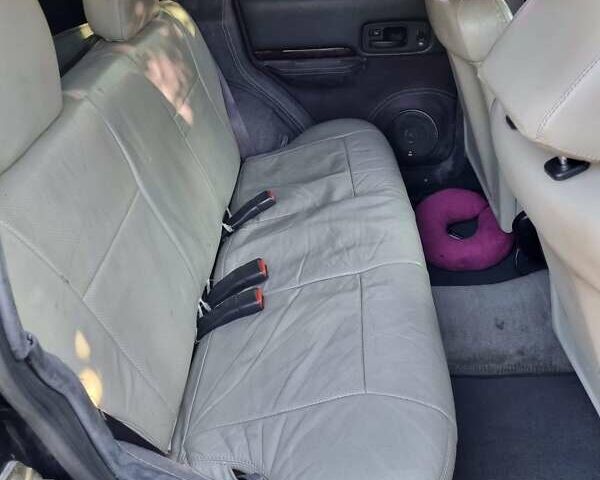 Зелений Джип Cherokee, об'ємом двигуна 4 л та пробігом 370 тис. км за 6700 $, фото 4 на Automoto.ua