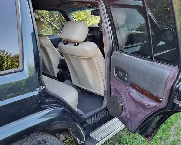 Зелений Джип Cherokee, об'ємом двигуна 4 л та пробігом 370 тис. км за 6700 $, фото 3 на Automoto.ua