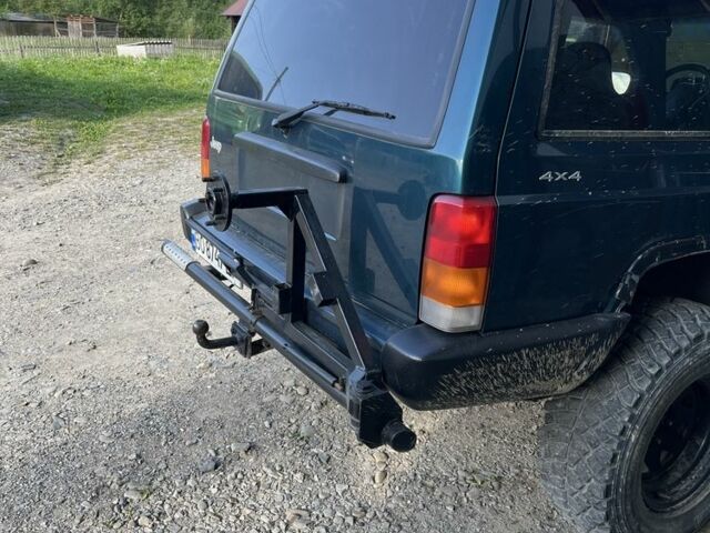 Зеленый Джип Чероки, объемом двигателя 4 л и пробегом 190 тыс. км за 7500 $, фото 2 на Automoto.ua