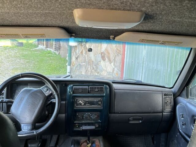 Зеленый Джип Чероки, объемом двигателя 4 л и пробегом 190 тыс. км за 7500 $, фото 4 на Automoto.ua