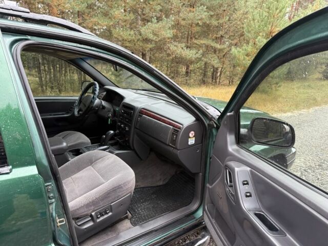 Зеленый Джип Чероки, объемом двигателя 3.1 л и пробегом 285 тыс. км за 3950 $, фото 9 на Automoto.ua