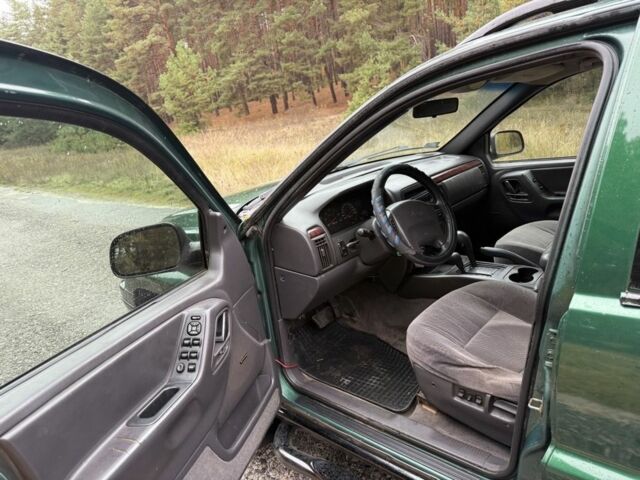 Зеленый Джип Чероки, объемом двигателя 3.1 л и пробегом 285 тыс. км за 3950 $, фото 10 на Automoto.ua