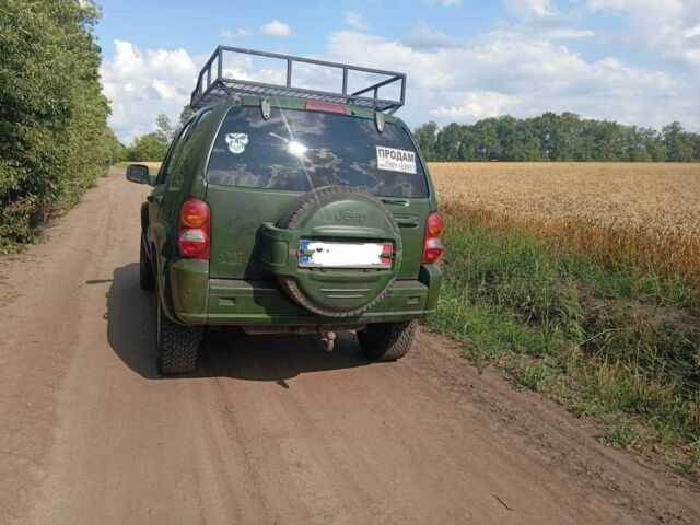 Зеленый Джип Чероки, объемом двигателя 2.5 л и пробегом 340 тыс. км за 1500 $, фото 4 на Automoto.ua