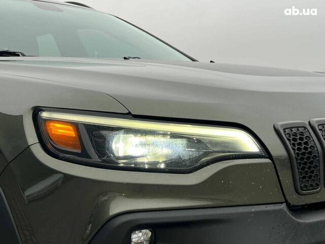 Зеленый Джип Чероки, объемом двигателя 3.2 л и пробегом 93 тыс. км за 21990 $, фото 12 на Automoto.ua