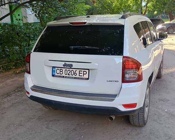 Білий Джип Compass, об'ємом двигуна 2.4 л та пробігом 245 тис. км за 10000 $, фото 11 на Automoto.ua