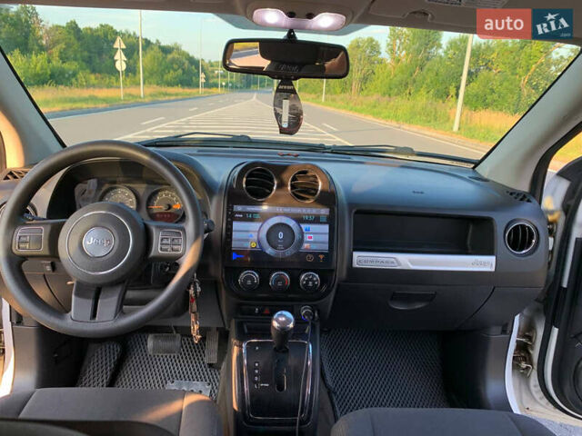 Білий Джип Compass, об'ємом двигуна 2.36 л та пробігом 210 тис. км за 9600 $, фото 14 на Automoto.ua