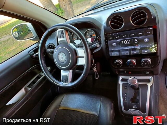 Білий Джип Compass, об'ємом двигуна 2.4 л та пробігом 208 тис. км за 9900 $, фото 5 на Automoto.ua