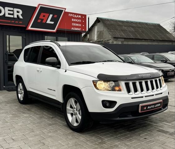 Білий Джип Compass, об'ємом двигуна 2.4 л та пробігом 122 тис. км за 10900 $, фото 1 на Automoto.ua