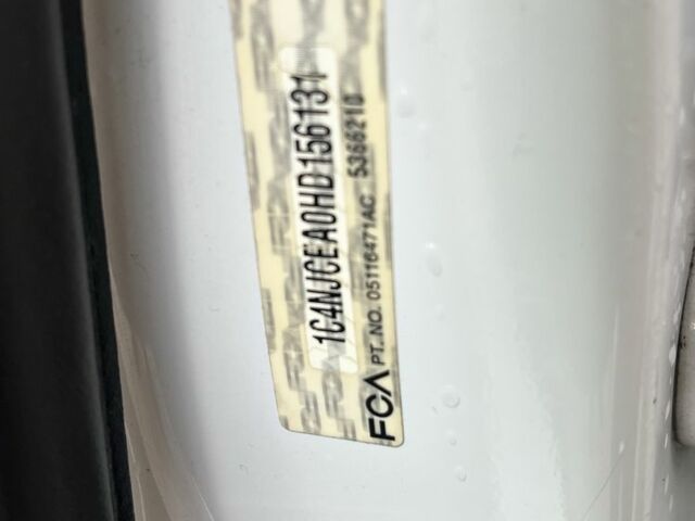 Білий Джип Compass, об'ємом двигуна 2 л та пробігом 126 тис. км за 12000 $, фото 6 на Automoto.ua