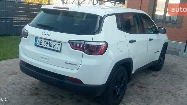 Білий Джип Compass, об'ємом двигуна 2.4 л та пробігом 204 тис. км за 11500 $, фото 3 на Automoto.ua