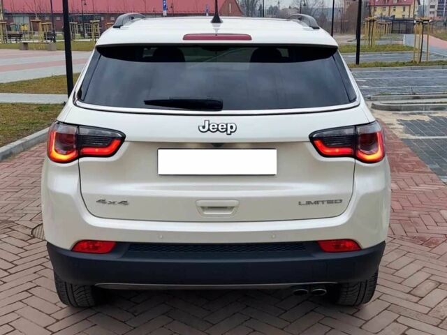 Білий Джип Compass, об'ємом двигуна 2.4 л та пробігом 64 тис. км за 10500 $, фото 1 на Automoto.ua