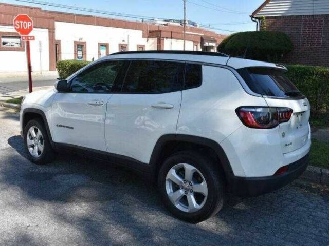 Білий Джип Compass, об'ємом двигуна 2.4 л та пробігом 62 тис. км за 6200 $, фото 2 на Automoto.ua