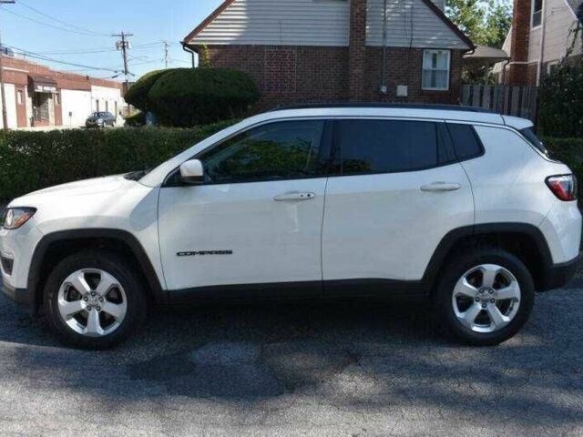 Білий Джип Compass, об'ємом двигуна 2.4 л та пробігом 62 тис. км за 6200 $, фото 1 на Automoto.ua