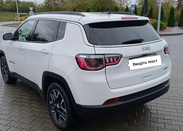 Білий Джип Compass, об'ємом двигуна 2.4 л та пробігом 97 тис. км за 17500 $, фото 6 на Automoto.ua
