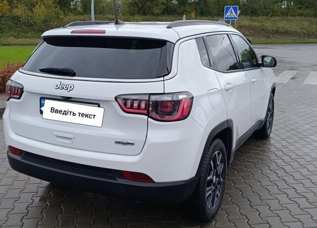 Білий Джип Compass, об'ємом двигуна 2.4 л та пробігом 97 тис. км за 17500 $, фото 5 на Automoto.ua