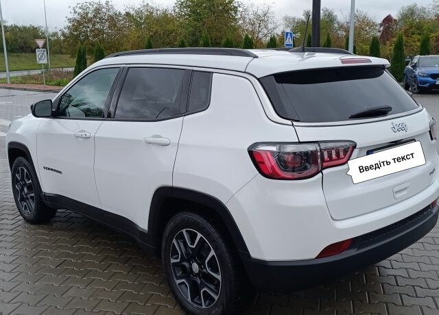 Білий Джип Compass, об'ємом двигуна 2.4 л та пробігом 97 тис. км за 17500 $, фото 3 на Automoto.ua