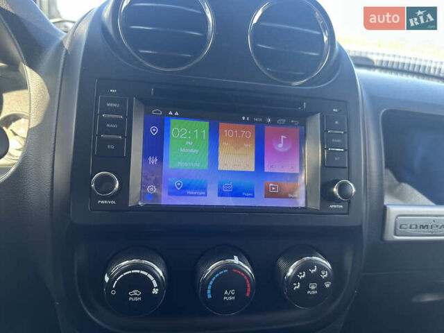 Червоний Джип Compass, об'ємом двигуна 2.36 л та пробігом 125 тис. км за 9200 $, фото 13 на Automoto.ua