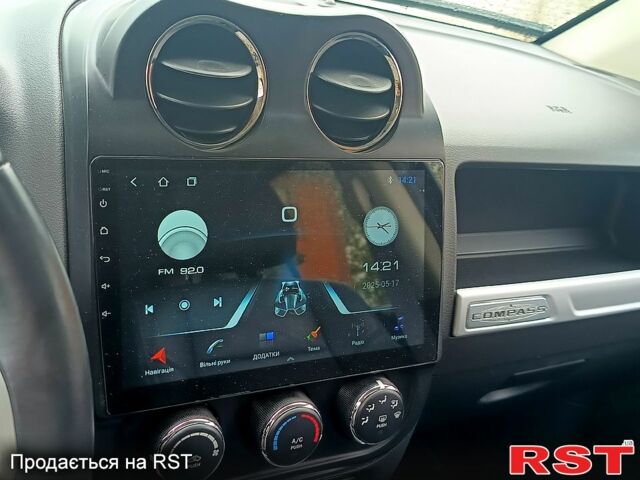 Червоний Джип Compass, об'ємом двигуна 2 л та пробігом 77 тис. км за 9800 $, фото 4 на Automoto.ua