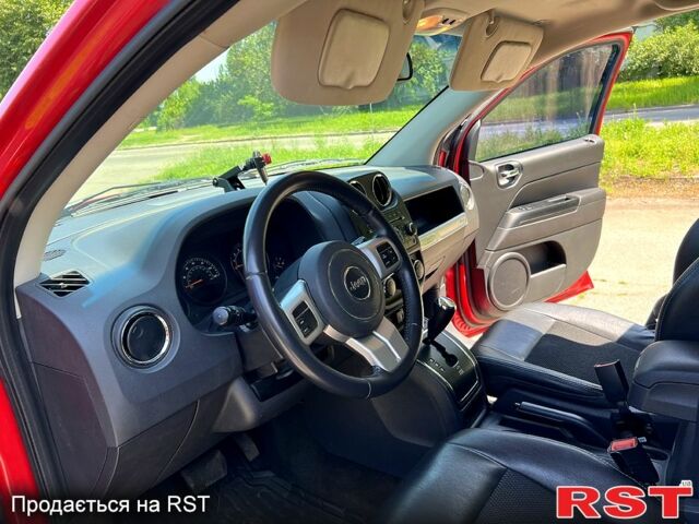 Червоний Джип Compass, об'ємом двигуна 2 л та пробігом 126 тис. км за 9700 $, фото 2 на Automoto.ua