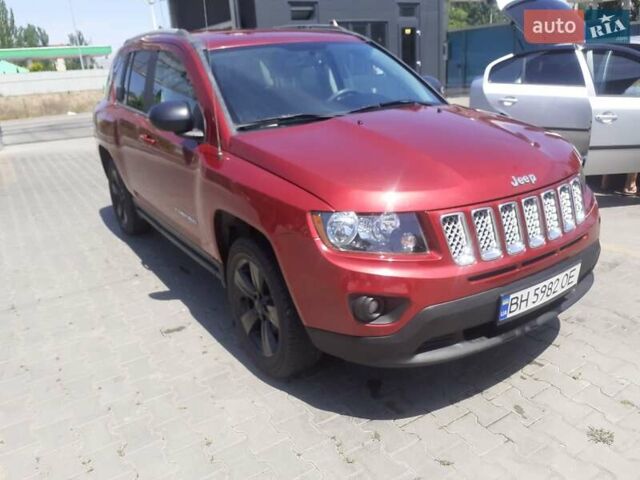 Червоний Джип Compass, об'ємом двигуна 2 л та пробігом 68 тис. км за 10800 $, фото 1 на Automoto.ua