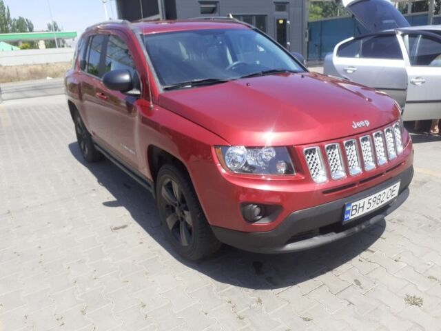 Червоний Джип Compass, об'ємом двигуна 2 л та пробігом 67 тис. км за 10700 $, фото 1 на Automoto.ua