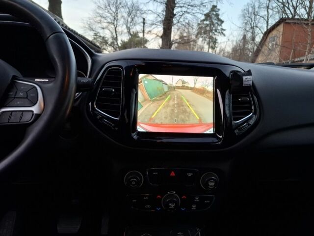 Червоний Джип Compass, об'ємом двигуна 2.4 л та пробігом 61 тис. км за 16000 $, фото 11 на Automoto.ua