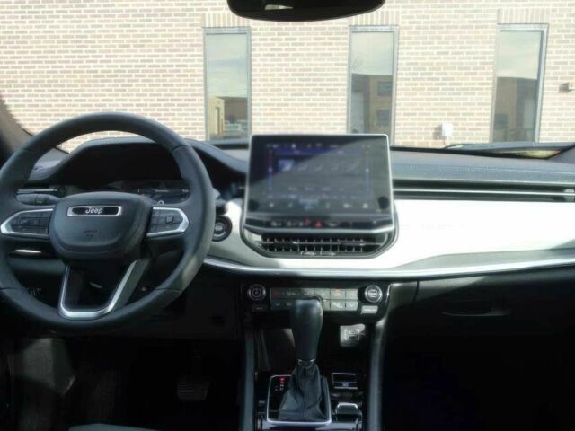 Сірий Джип Compass, об'ємом двигуна 2 л та пробігом 9 тис. км за 10000 $, фото 6 на Automoto.ua