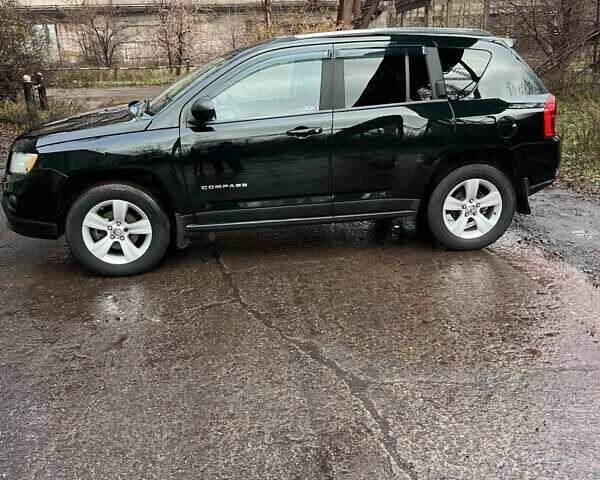 Зелений Джип Compass, об'ємом двигуна 2.36 л та пробігом 170 тис. км за 9400 $, фото 9 на Automoto.ua