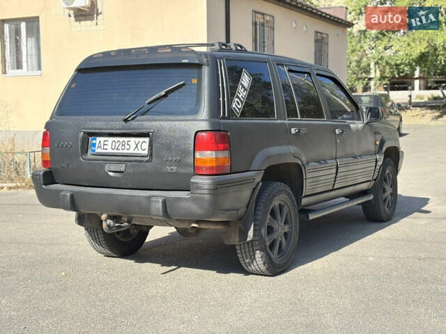 Белый Джип Гранд Чероки, объемом двигателя 3.96 л и пробегом 270 тыс. км за 6800 $, фото 5 на Automoto.ua