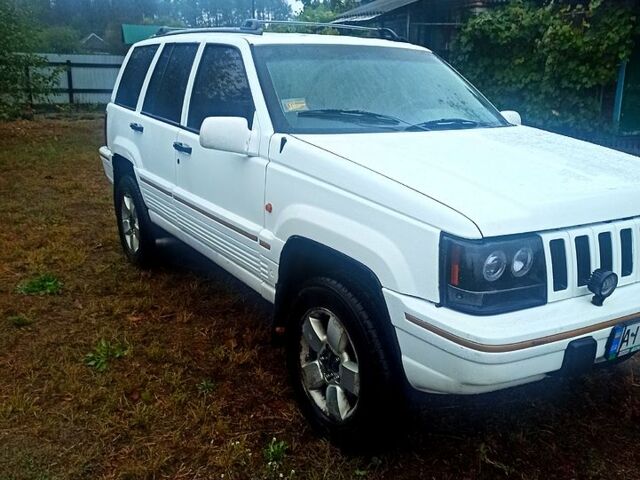 Білий Джип Grand Cherokee, об'ємом двигуна 4 л та пробігом 400 тис. км за 4500 $, фото 5 на Automoto.ua