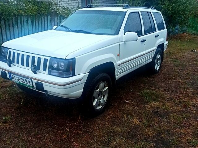 Білий Джип Grand Cherokee, об'ємом двигуна 4 л та пробігом 400 тис. км за 4500 $, фото 4 на Automoto.ua