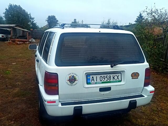 Білий Джип Grand Cherokee, об'ємом двигуна 4 л та пробігом 400 тис. км за 4500 $, фото 1 на Automoto.ua