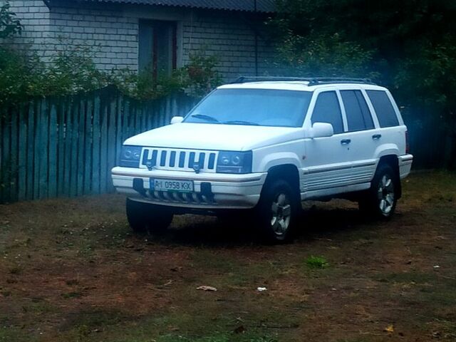 Білий Джип Grand Cherokee, об'ємом двигуна 4 л та пробігом 400 тис. км за 4500 $, фото 2 на Automoto.ua