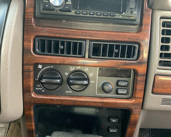 Білий Джип Grand Cherokee, об'ємом двигуна 5.2 л та пробігом 260 тис. км за 6500 $, фото 10 на Automoto.ua