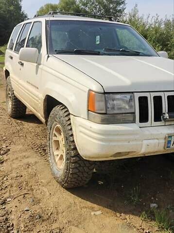Білий Джип Grand Cherokee, об'ємом двигуна 5.2 л та пробігом 400 тис. км за 5500 $, фото 6 на Automoto.ua