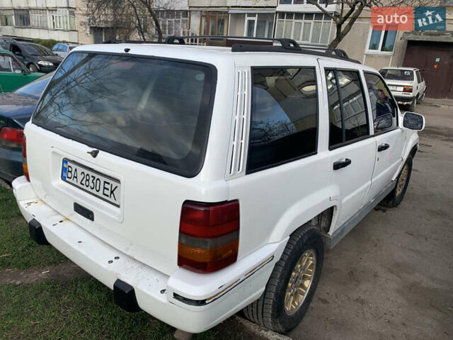 Білий Джип Grand Cherokee, об'ємом двигуна 5.2 л та пробігом 260 тис. км за 6500 $, фото 2 на Automoto.ua