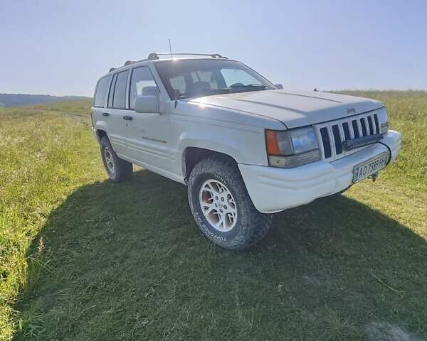 Білий Джип Grand Cherokee, об'ємом двигуна 5.2 л та пробігом 400 тис. км за 5500 $, фото 17 на Automoto.ua