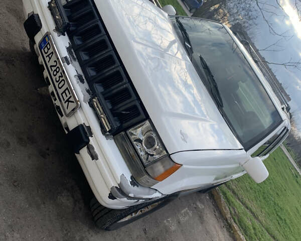 Білий Джип Grand Cherokee, об'ємом двигуна 5.2 л та пробігом 260 тис. км за 6500 $, фото 4 на Automoto.ua