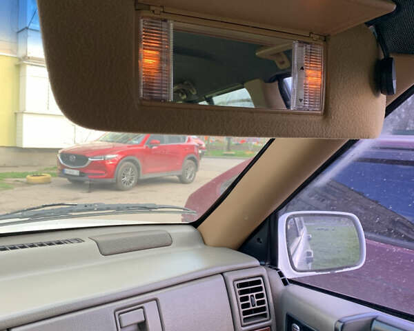 Білий Джип Grand Cherokee, об'ємом двигуна 5.2 л та пробігом 260 тис. км за 6500 $, фото 14 на Automoto.ua