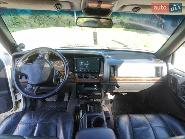 Білий Джип Grand Cherokee, об'ємом двигуна 5.2 л та пробігом 400 тис. км за 5500 $, фото 12 на Automoto.ua