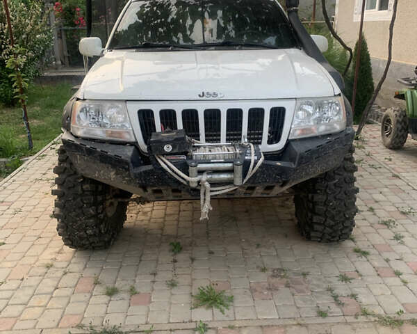 Білий Джип Grand Cherokee, об'ємом двигуна 4.7 л та пробігом 245 тис. км за 12500 $, фото 2 на Automoto.ua