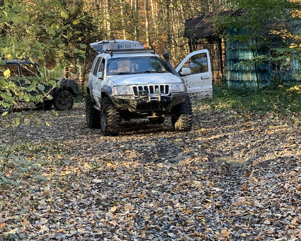 Білий Джип Grand Cherokee, об'ємом двигуна 4.7 л та пробігом 245 тис. км за 12500 $, фото 11 на Automoto.ua