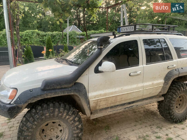 Білий Джип Grand Cherokee, об'ємом двигуна 4.7 л та пробігом 245 тис. км за 12500 $, фото 5 на Automoto.ua
