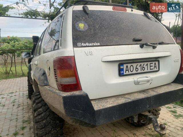 Білий Джип Grand Cherokee, об'ємом двигуна 4.7 л та пробігом 245 тис. км за 12500 $, фото 1 на Automoto.ua