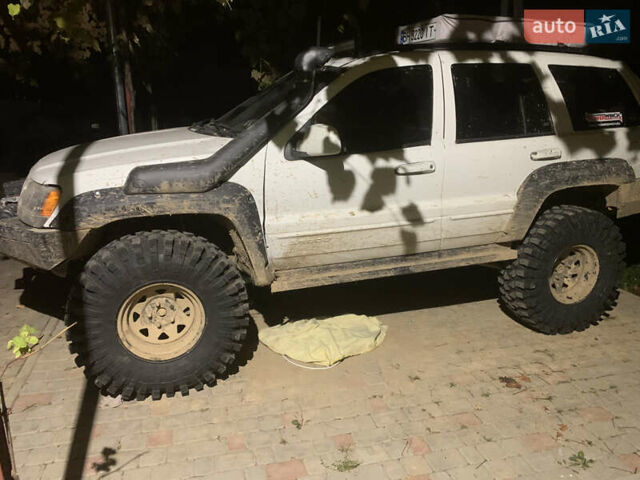 Білий Джип Grand Cherokee, об'ємом двигуна 4.7 л та пробігом 245 тис. км за 12500 $, фото 14 на Automoto.ua