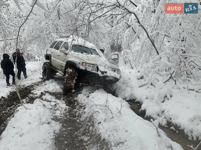 Білий Джип Grand Cherokee, об'ємом двигуна 4.7 л та пробігом 245 тис. км за 12500 $, фото 8 на Automoto.ua