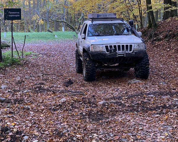 Білий Джип Grand Cherokee, об'ємом двигуна 4.7 л та пробігом 245 тис. км за 12500 $, фото 12 на Automoto.ua