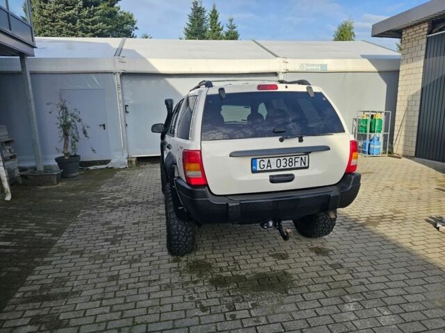 Білий Джип Grand Cherokee, об'ємом двигуна 4 л та пробігом 285 тис. км за 2777 $, фото 3 на Automoto.ua