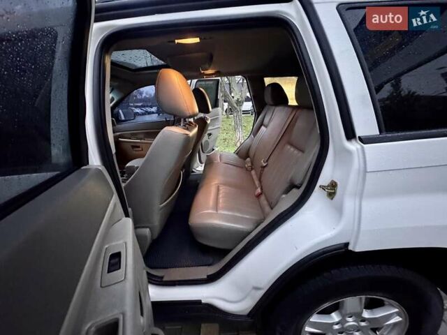 Белый Джип Гранд Чероки, объемом двигателя 4.7 л и пробегом 228 тыс. км за 7400 $, фото 64 на Automoto.ua