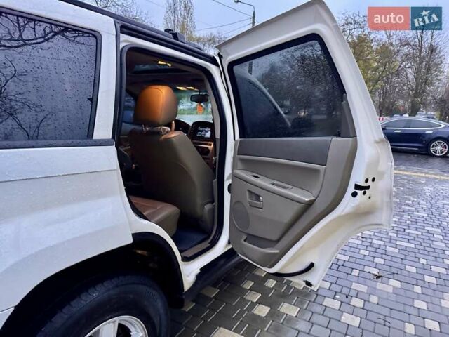 Белый Джип Гранд Чероки, объемом двигателя 4.7 л и пробегом 228 тыс. км за 7400 $, фото 67 на Automoto.ua